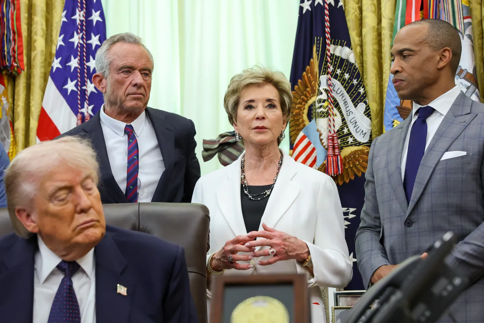 Education Secretary Linda McMahon, center, speaks alongside Health and Human Services Secretary Robert F. Kennedy Jr., left, and Housing and Urban Development Secretary Scott Turner during a proclamation signing by President Donald Trump in the Oval Office of the White House on May 5 in Washington, D.C. (Photo by Anna Moneymaker/Getty Images)