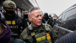 US Border Patrol commander Gregory Bovino walks to his vehicle at a gas station in Minneapolis, Minnesota on January 21, 2026.
